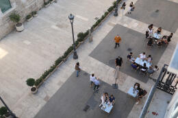 People sit on a terrace of a bar, as some Spanish provinces are allowed to ease lockdown restrictions during phase one, amid the coronavirus disease (COVID-19) outbreak, in Valencia, Spain, May 18, 2020. REUTERS/Nacho Doce