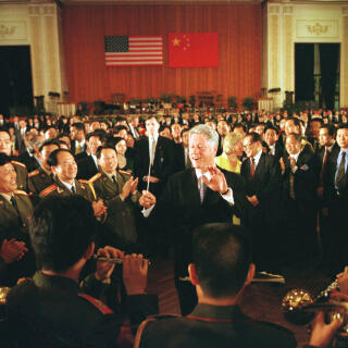 332971 02: China / Xian / June 26Th, 1998 (663.617) Bill Clinton And Family During His Visit In China, Welcome By Chinese President Jiang Zemin In Xian. Here, Playing Conductor During A Concert.  (Photo By Cynthia Johnson/Getty Images)