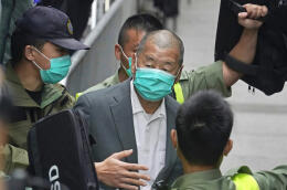 FILE - In this Feb. 9, 2021, file photo, democracy advocate Jimmy Lai leaves the Hong Kong's Court of Final Appeal in Hong Kong. Hong Kong tycoon and prominent pro-democracy activist Lai and two others were convicted Thursday, Dec. 9, for their roles in last year's banned Tiananmen candlelight vigil, amid a crackdown on dissent in the city and Beijing's tightening political control. (AP Photo/Kin Cheung, File)