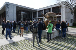 Students demonstrate against islamophobia outside the campus of the Institute of Political Studies (aka Sciences Po) in Saint-Martin-d'Heres, near Grenoble, on March 9, 2021. - The demonstration takes place after accusations of islamophobia targeting two professors, who had been placed under police protection. One of the professors is in charge of a course called "Islam and Muslims in contemporary France" while the other is a lecturer in German, who has taught at the faculty for 25 years. (Photo by Philippe DESMAZES / AFP)
