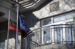 Lithuanian and European Union flags fly outside the Lithuanian Embassy in Beijing, Thursday, Dec. 16, 2021. Lithuania said Wednesday, Dec. 15, 2021, that it has closed its embassy in Beijing and pulled its last diplomat out of the Chinese capital, a move that came amid a spat over the European Union nation allowing Taiwan to open a representative office in its capital, Vilnius. (AP Photo/Mark Schiefelbein)