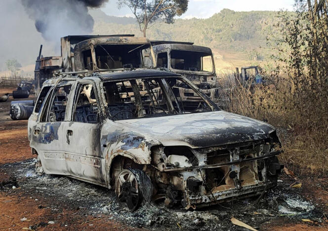 Several vehicles were found charred with bodies inside on December 24 in Hpruso, Burma.
