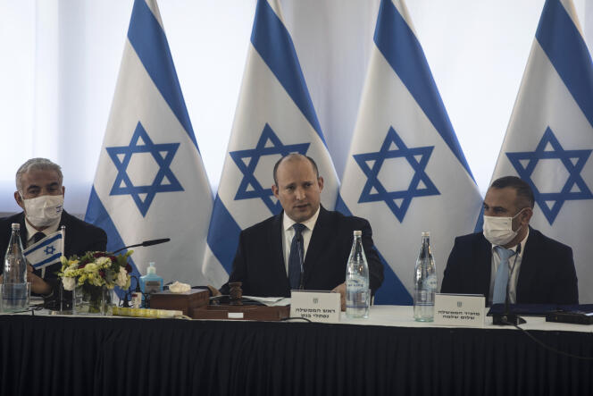 Israeli Prime Minister Naftali Bennett (center), during a special cabinet meeting in the kibbutz of Mevo Hama, in the Israeli-occupied Golan Heights, Sunday, December 26, 2021.