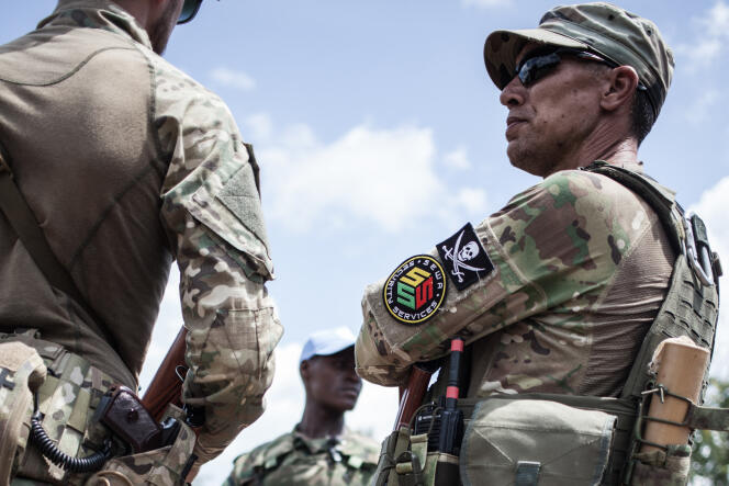 Agents of the Russian private security company Sewa Security providing close protection to Central African President Touadéra, at Berengo camp (Central African Republic), in August 2018.