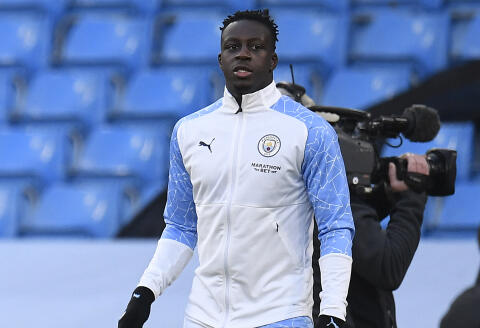 (FILES) In this file photo taken on December 05, 2020 Manchester City's French defender Benjamin Mendy arrives for the English Premier League football match between Manchester City and Fulham at the Etihad Stadium in Manchester, north west England. - Manchester City and France international footballer Benjamin Mendy, who has been charged with seven counts of rape, was on January 7, 2022, freed on bail by a court in northwest England. (Photo by PETER POWELL / POOL / AFP) / RESTRICTED TO EDITORIAL USE. No use with unauthorized audio, video, data, fixture lists, club/league logos or 'live' services. Online in-match use limited to 120 images. An additional 40 images may be used in extra time. No video emulation. Social media in-match use limited to 120 images. An additional 40 images may be used in extra time. No use in betting publications, games or single club/league/player publications. /