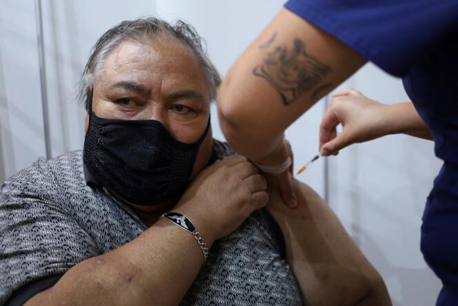 A man receives his fourth dose of the Covid-19 vaccine in Santiago on January 11, 2022, as the campaign started the day before in Chile.