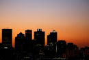 FILE PHOTO: The buildings with the logos of three of South Africa's biggest banks, ABSA, Standard Bank and First National Bank (FNB) are seen against the city skyline in Cape Town, South Africa, September 3, 2017. REUTERS/Mike Hutchings/File Photo