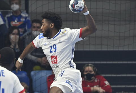 Benoit Kounkoud of France throws the ball at the goal during Mens' Handball European Championship peliminary round Group C third round match France vs. Serbia in Pick Arena in Szeged, Hungary, Monday, Jan. 17, 2022. (Tibor Illyes/MTI via AP)