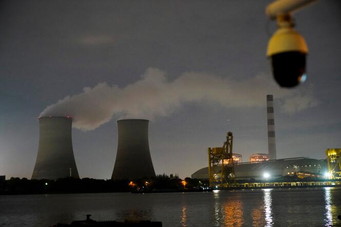     A surveillance camera near a coal-fired power plant in Shanghai on October 14, 2021.