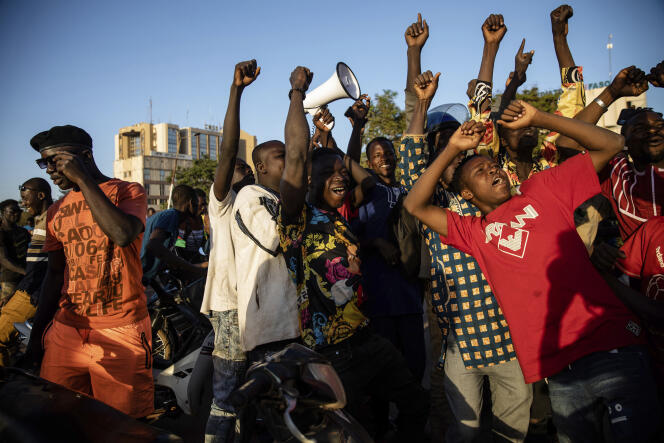 Hundreds of residents took to the streets in Ouagadougou to celebrate the announcement of the military coup in Burkina Faso on January 24, 2022.