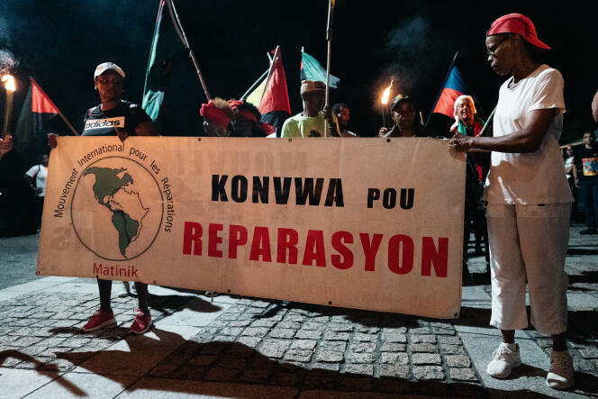 Marche organisée par le Mouvement international pour les réparations pour commémorer le 22 mai 1848, jour de l'abolition de l'esclavage en Martinique, à Saint-Pierre, le 22 mai 2019.
