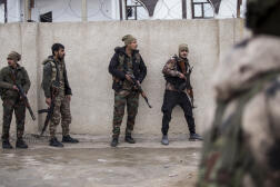 Les Forces démocratiques syriennes, à Hassaké, dans le nord-est de la Syrie, jeudi 27 janvier.