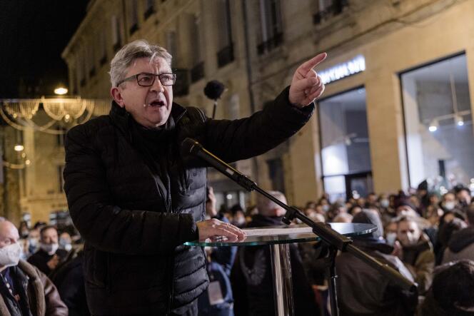 Bordeaux, France, January 24, 2022 - Before his meeting at the Fémina theater, Jean Luc Mélenchon, candidate for La France insoumise (LFI) left-wing party in the 2022 French presidential election, standing on a podium in front of the theater’s entrance, addresses the people who could not enter the room because of lack of space.