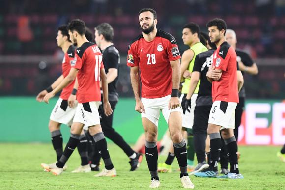 Egypt's forward Marwan Hamdi (C) react after losing the Africa Cup of Nations (CAN) 2021 final football match between Senegal and Egypt at Stade d'Olembe in Yaounde on February 6, 2022. (Photo by CHARLY TRIBALLEAU / AFP)