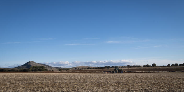 An agricultural tractor working on crops near Quiñonería, a village with 6 registered inhabitant located in Soria, Spain. 

A week before the regional elections in Castilla y León, Soria ¡YA!, a citizen platform, runs for the election in Soria with a political campaign focused on fighting against depopulation in the region. 
Feb. 5, 2022. Soria. Castilla y León. Spain. ELENA DEL ESTAL POUR LE MONDE