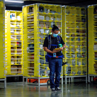EASTVALE, CA - AUGUST 31: Amnesty technician Gustavo Morales controls logistics robots at Amazon fulfillment center in Eastvale on Tuesday, Aug. 31, 2021. (Photo by Watchara Phomicinda/MediaNews Group/The Press-Enterprise via Getty Images)