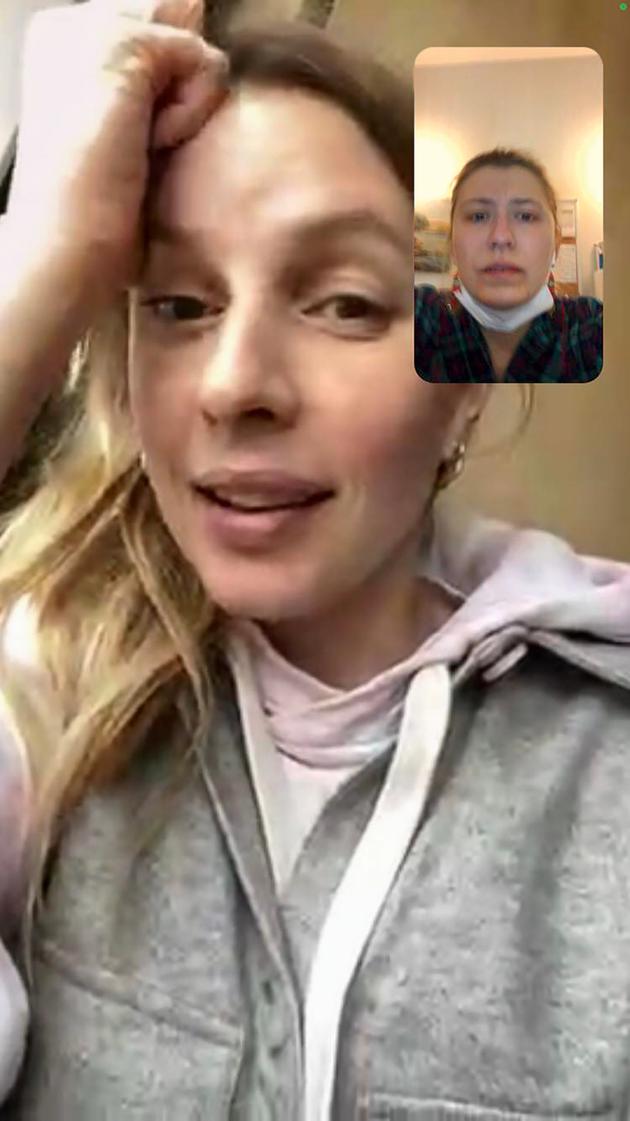 Sasza w Kijowie na wezwanie ze swoją starszą siostrą Olgą z podziemnego parkingu, na którym schroniła się podczas bombardowania 24 lutego 2022 r.