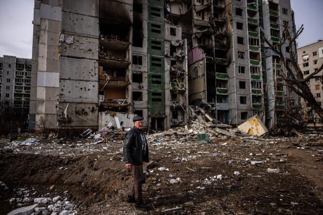 A passerby at the site of the March 4, 2022 bombing in Chernihiv. 