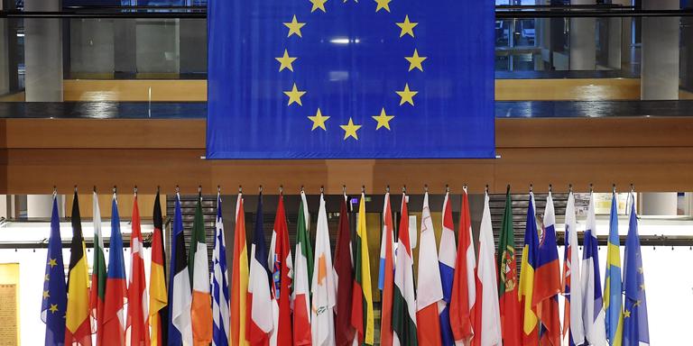 A picture taken on February 14 , 2022 shows national flags of European Union's member countries at the European Parliament in Strasbourg, France. (Photo by FREDERICK FLORIN / AFP)