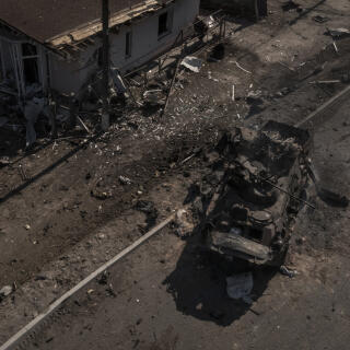 A destroyed Russian tank is seen after battles on a main road near Brovary, north of Kyiv, Ukraine, Thursday, March 10, 2022. (AP Photo/Felipe Dana)