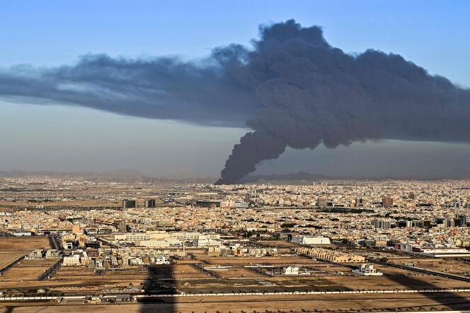 A cloud of smoke rises from an Aramco refinery in Jeddah, Saudi Arabia, on March 25, 2022.