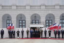 U.S. President Joe Biden, center left, and Polish President Andrzej Duda, center, attend a military welcome ceremony at the Presidential Palace in Warsaw, Poland, on Saturday, March 26, 2022. (AP Photo/Czarek Sokolowski)