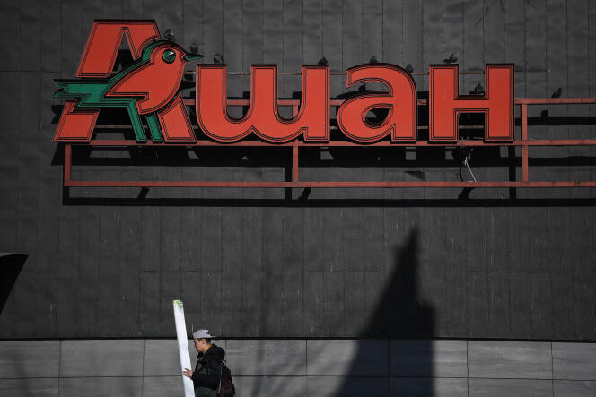 The French retailer Auchan's logo, pictured in a shopping mall in Moscow, March 24, 2022.