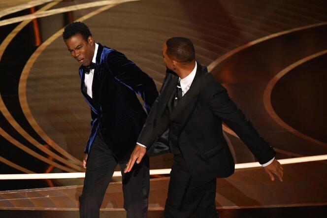 Actor Will Smith beats presenter Chris Rock at the 94th Academy Awards in Hollywood on March 27, 2022.