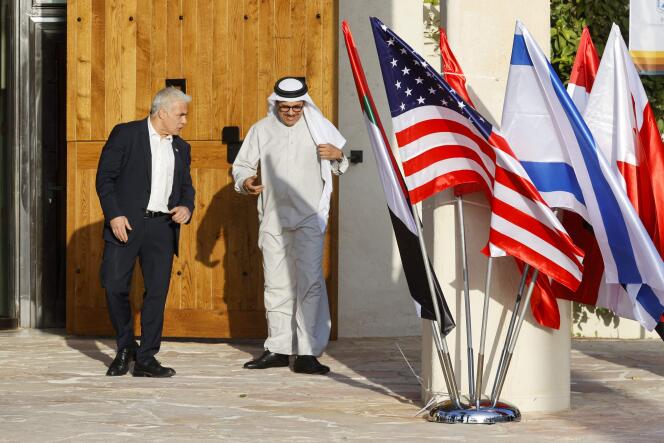 Israeli Foreign Minister Yair Lapid (left) greets his Bahraini counterpart, Abdullatif Ben Rashid Al-Zayani, at Sde Boker in Israel's Negev desert on March 27, 2022. 
