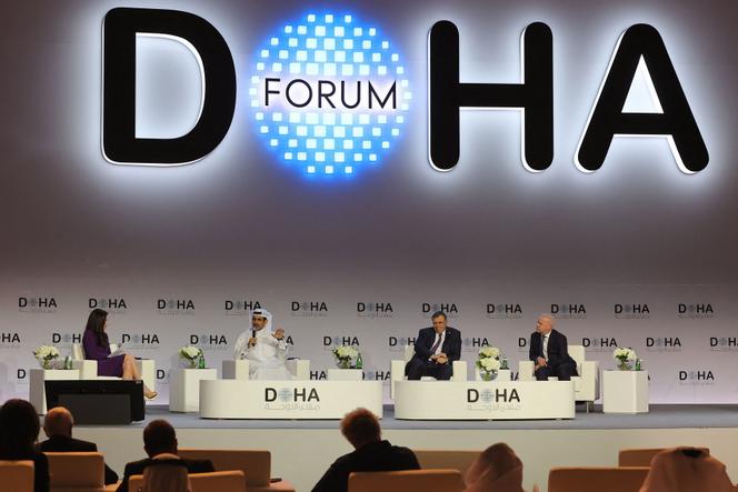 Saad Sheridan al-Kafi (in white), Minister of Energy Affairs, is the Chairman and CEO of Qatar Energy, followed by Patrick Boanne of Total Energy and Anders Opal, President and CEO of Equinox.  Doha Forum, March 26, 2022.