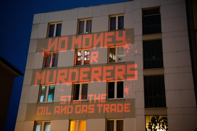 It is projected on the Russian consulate: “No money for the murderers.  Stop the Oil and Gas Trade,” in Frankfurt, Germany, on April 4, 2022.