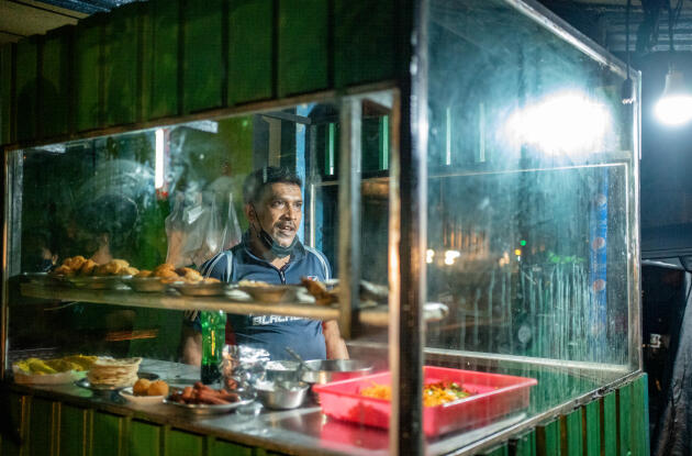 A street restaurant experiencing regular power outages, in Soysapura, Sri Lanka, March 2, 2022.