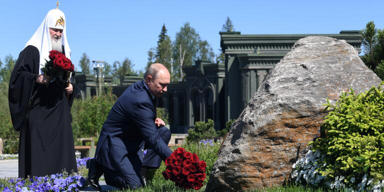 Russian President Vladimir Putin, right, and Russian Orthodox Church Patriarch Kirill lay flowers to a monument to Mothers of the Victors after a religious service marking the 79th anniversary of the Nazi invasion of the Soviet Union, at the Cathedral in the Patriot Park outside Moscow, Russia, Monday, June 22, 2020. The country's new Cathedral of Russian Armed Forces was built and dedicated to the Soviet victory in World War II. (Alexei Nikolsky, Sputnik, Kremlin Pool Photo via AP)