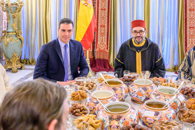 In this photo of the Moroccan Royal Palace, King Mohammed VI (right) and Spanish Prime Minister Pedro Sanchez pose for an iftar meal, at the royal king's residence in Salé, Morocco, April 7, 2022.