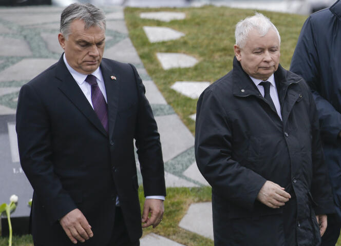 FILE --Hungarian Prime Minister Viktor Orban, left, walks with Jaroslaw Kaczynski, center, the leader of Poland's ruling party, Law and Justice, and Polish Prime Minister Mateusz Morawiecki, during the inauguration of a memorial for the Smolensk plane crash, in Budapest , Hungary, Friday, April 6, 2018. Poland's deputy prime minister and key politician, Jaroslaw Kaczynski has used strong words to criticize long-time ally, Hungary's Prime Minister Viktor Orban and said Orban should be sent to an eye doctor if he says he is not sure about reports and images of alleged Russian killings in Bucha, in Ukraine.(AP Photo/Darko Vojinovic,file)