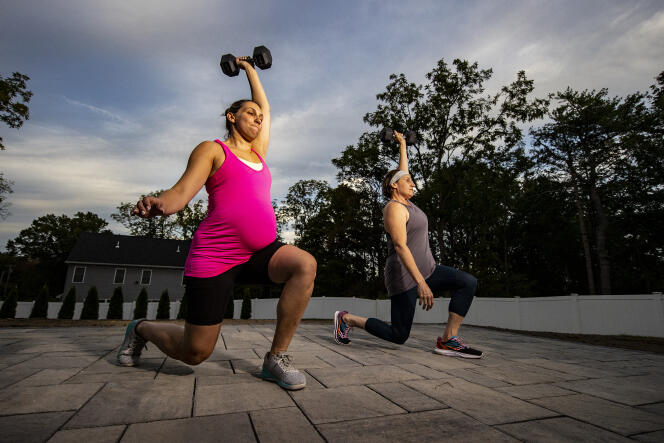 CrossFit athlete Kathy Devantier Prabhu, seven months pregnant, trains with her mother Paula Devantier in Niskayun, New York, September 21, 2021.