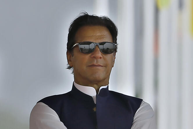 Pakistani Prime Minister Imran Khan attends a military parade on March 23, 2022 in Islamabad.