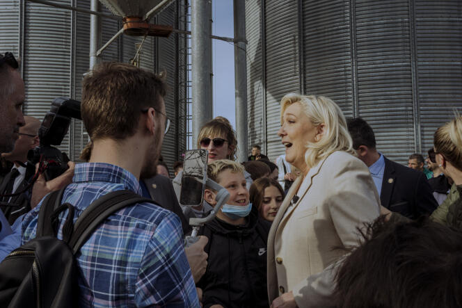 The Rassemblement National candidate, Marine Le Pen, visits a grain farm in Soucy, April 11, 2022.