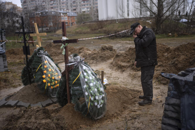 Oleg, 56, mourns for his mother Inna, 86, who was murdered in Bucha, on the outskirts of Kyiv, on April 10, 2022.