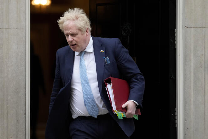 Britain's Prime Minister Boris Johnson leaves from 10 Downing Street in London on March 30, 2022. 