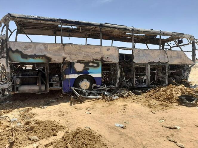 A tourist bus that caught fire following an accident on April 13, 2022 in Aswan, Egypt.  