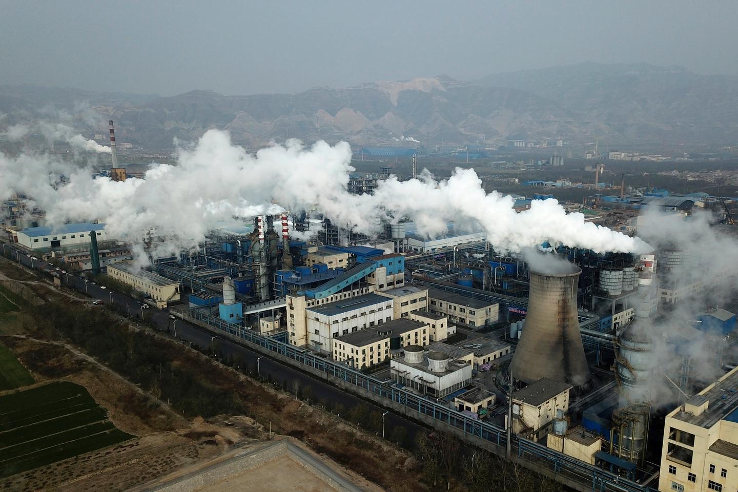 Blaze at coal mine company building in China kills 26