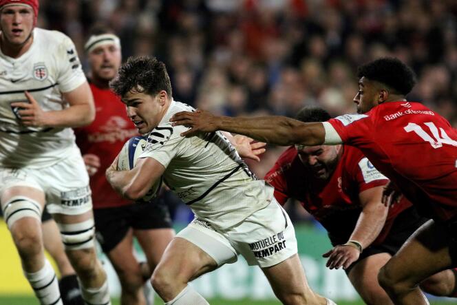 Toulouse's French scrum-half Antoine Dupont scores the final try during the European Rugby Champions Cup Round of 16 second leg rugby match between Ulster and Stade Toulouse at the Kingspan Stadium in Belfast, Northern Ireland on 16 April 2022. (Photo by Pablo Fe / AFP)