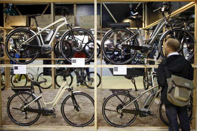Electric bicycles made by French company Mustache on display during the Cycle Show 2013 in Paris on September 13, 2013.