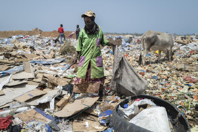 Ms. Sarr, called 'Mother Sambo,' at the Mbeubeuss dump, in Malika, a suburb of Dakar, on February 24, 2022.