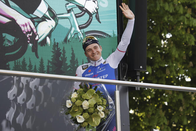 The Belgian Remco Evenepoel climbs on the podium of Liège-Bastogne-Liège after his victory in the classic, on April 24, 2022 in Liège.