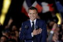 French President Emmanuel Macron gestures as he arrives to deliver a speech after being re-elected as president, following the results in the second round of the 2022 French presidential election, during his victory rally at the Champs de Mars in Paris, France, April 24, 2022. REUTERS/Benoit Tessier TPX IMAGES OF THE DAY