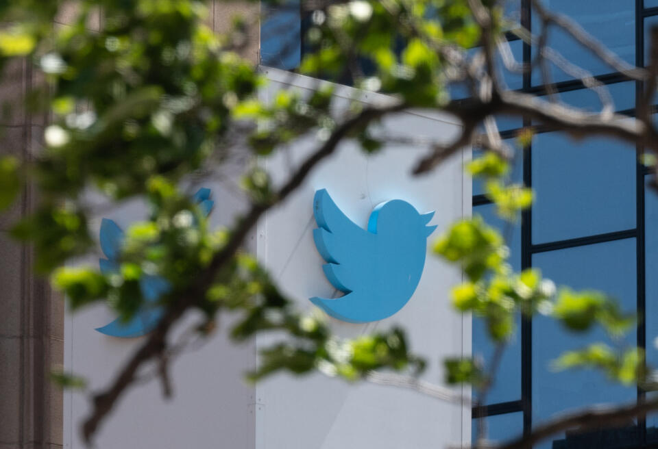 The Twitter logo is seen at their headquarters on April 26, 2022 in downtown San Francisco, California. - Billionaire Elon Musk is capturing a social media prize with his deal to buy Twitter, which has become a global stage for companies, activists, celebrities, politicians and more. (Photo by Amy Osborne / AFP)