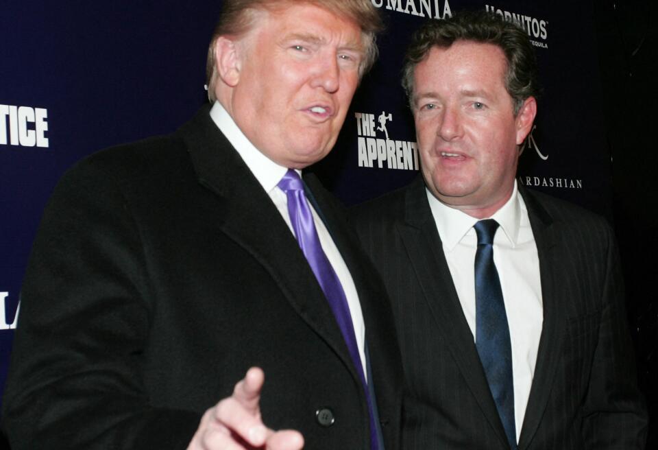 NEW YORK - NOVEMBER 10: Donald Trump (L) and Piers Morgan celebrate Kim Kardashian's appearance on "The Apprentice" at Provacateur on November 10, 2010 in New York, New York. John W. Ferguson/Getty Images/AFP (Photo by John W. Ferguson / GETTY IMAGES NORTH AMERICA / Getty Images via AFP)