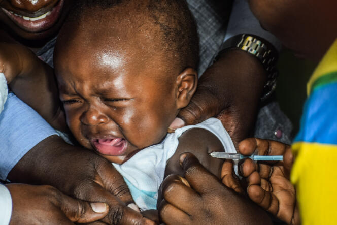 A child receives a dose of malaria vaccine in Ndhiwa, Kenya, September 2019.